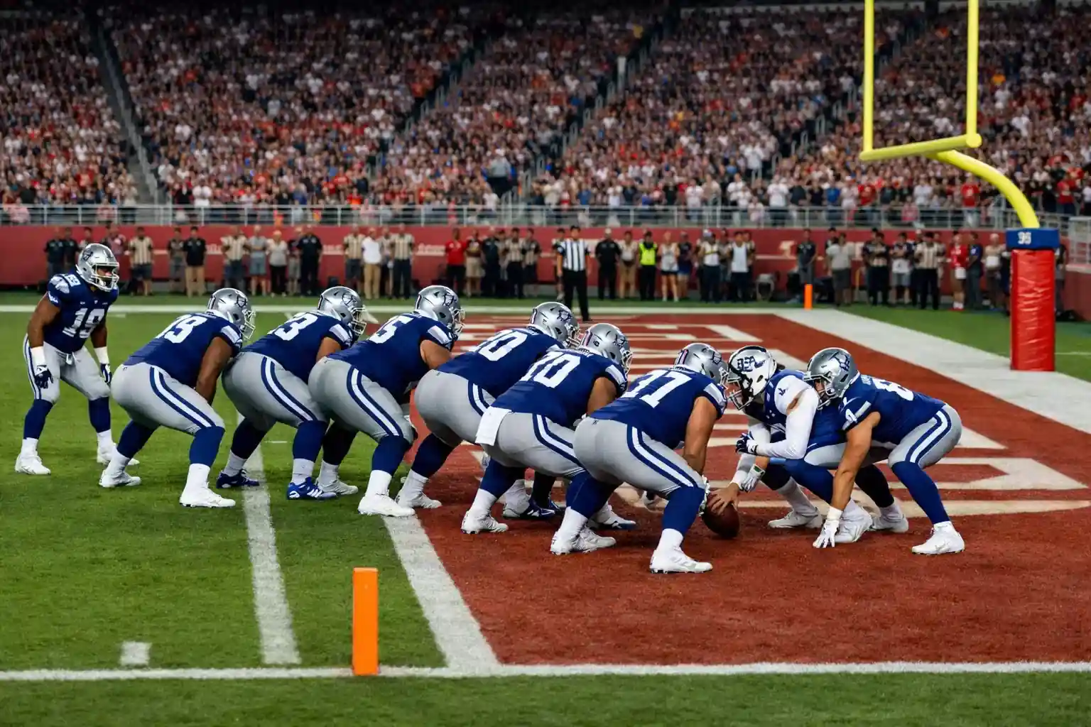 NFL offense in red zone formation near goal line